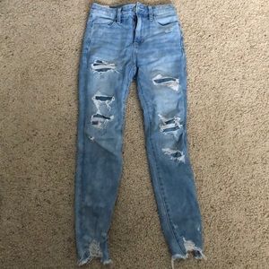 American Eagle covered ripped jeans